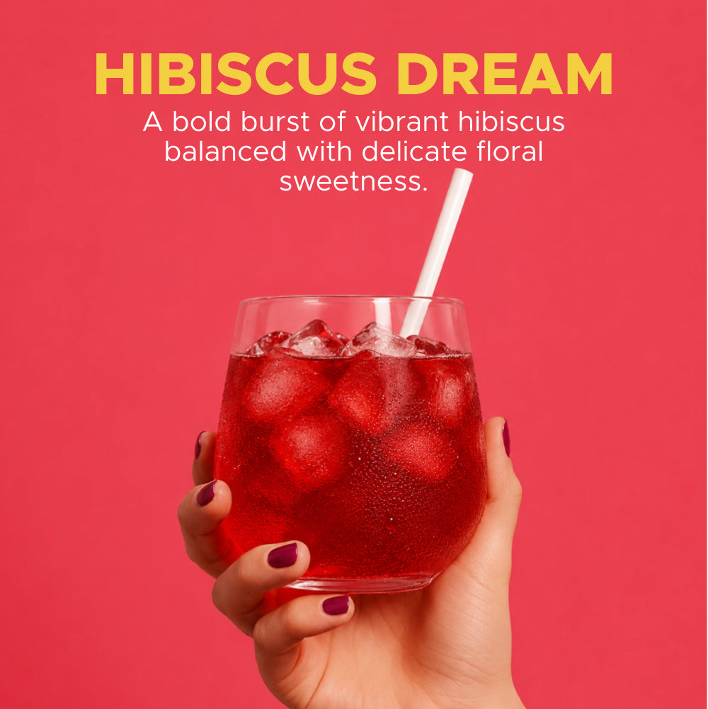 OneShot Hydrate Hibiscus Dream lifestyle photo showing electrolyte drink being prepared in a glass of water