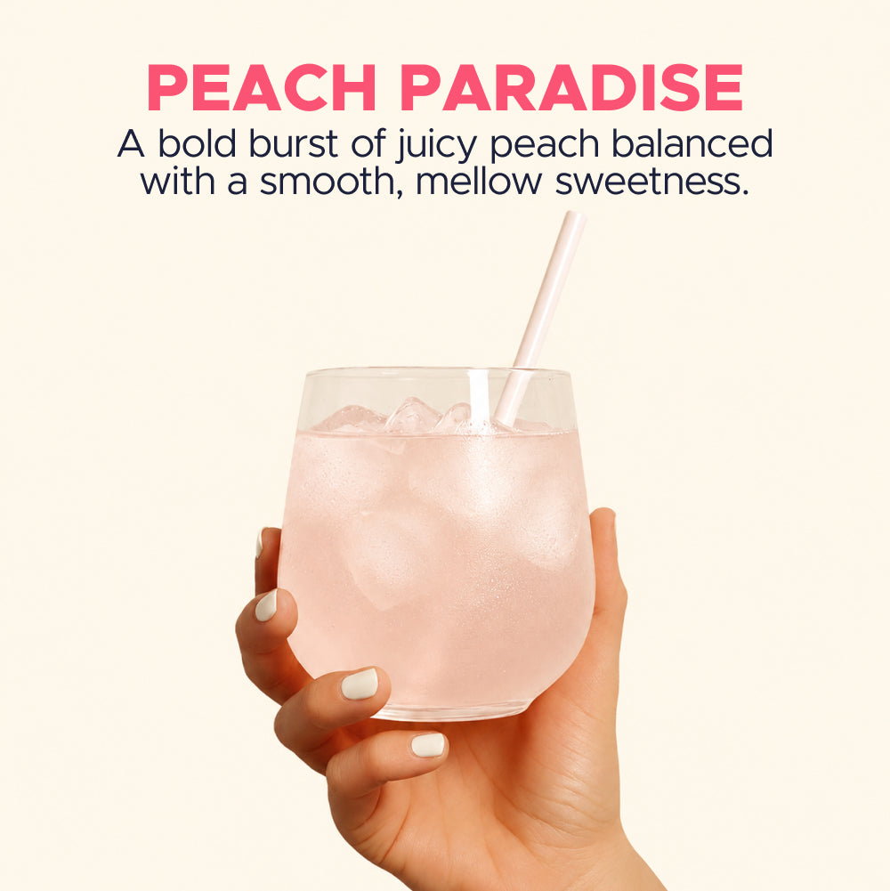 OneShot Hydrate Peach Paradise lifestyle photo showing electrolyte drink being prepared in a glass of water